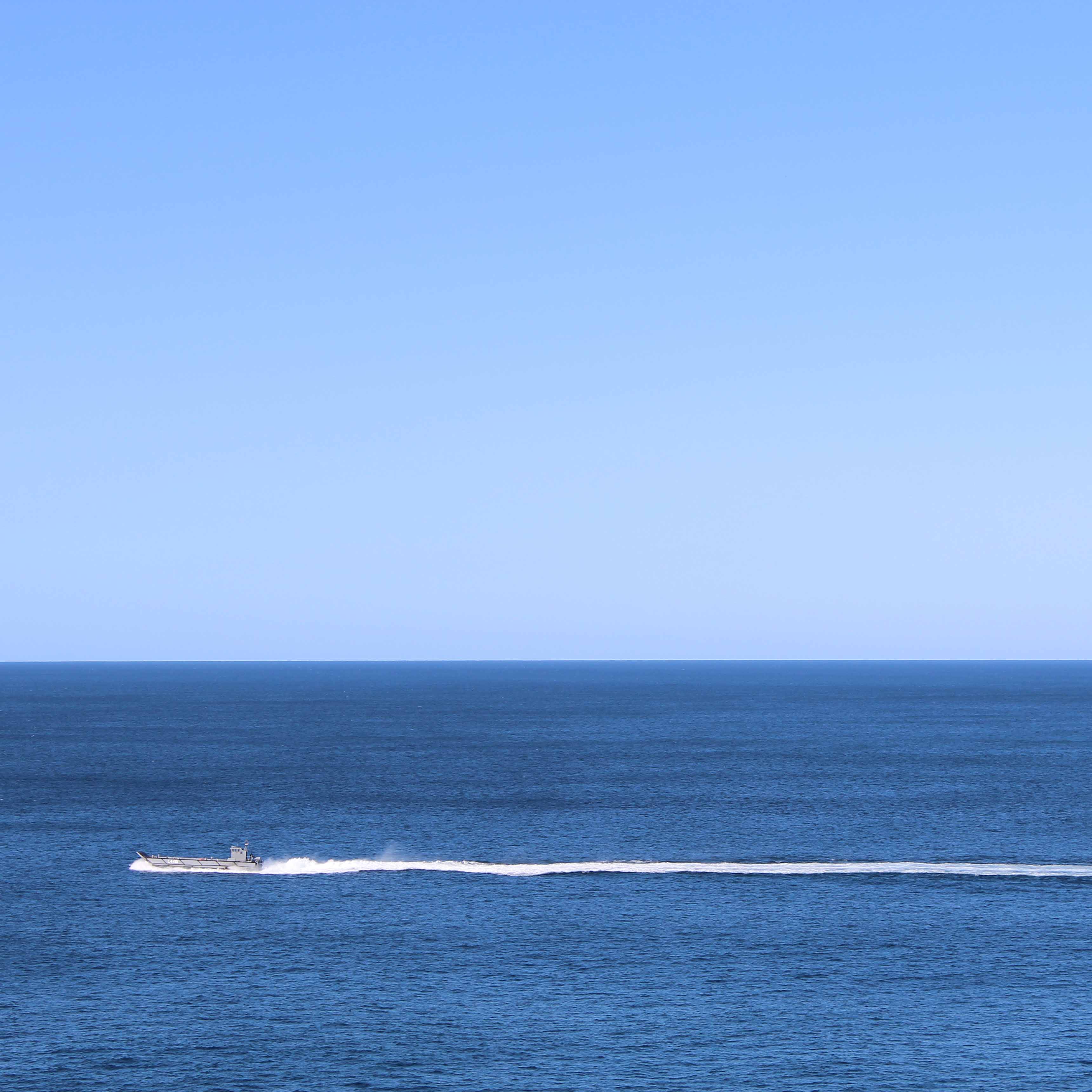 Image of a boat's wake demonstrating 'time'